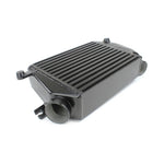 Black powder-coated PERRIN bar-and-plate top mount intercooler for Subaru WRX and Forester XT.