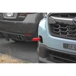 Red PERRIN front tow hook and threaded mounting bolt for select Subaru WRX and Crosstrek models.