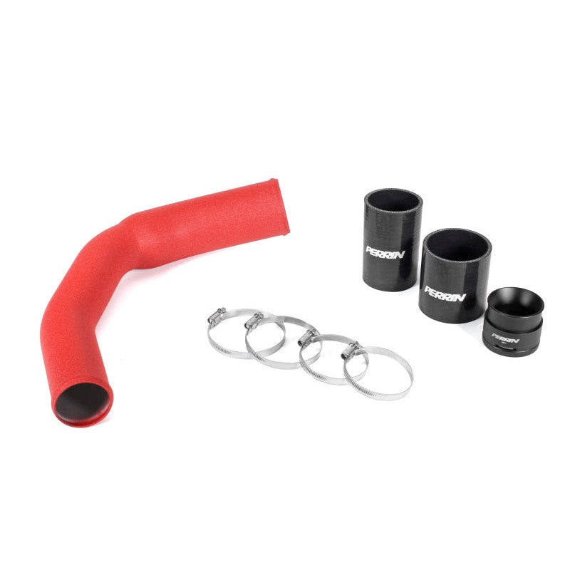 Red powder-coated PERRIN mandrel-bent aluminum charge pipe for Subaru FA24 turbo engines.