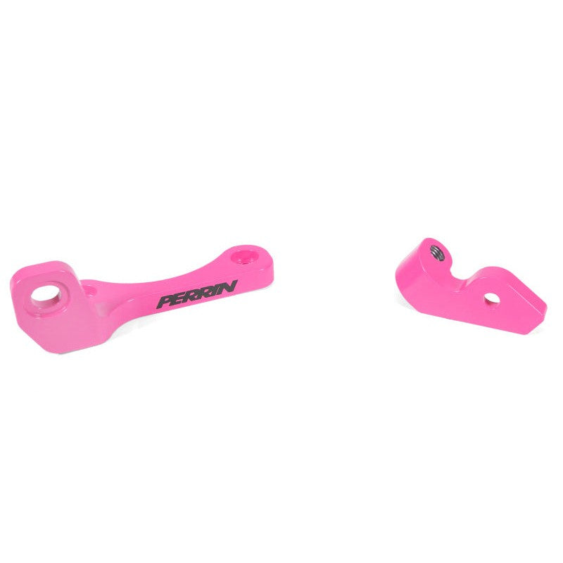 Hyper Pink PERRIN intercooler support bracket for Subaru WRX and Ascent turbo engines.