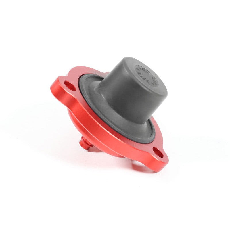 Red anodized PERRIN aluminum diverter valve for Subaru WRX, Legacy, and Ascent engines.