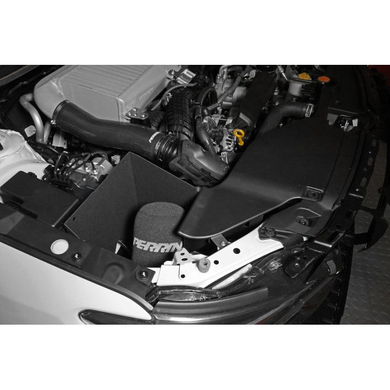 Red PERRIN cold air intake system with high-flow filter and black heatshield for 2022-2026 Subaru WRX.