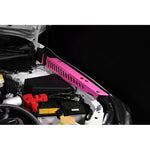 A pair of PERRIN Hyper Pink powder-coated aluminum fender shrouds for the 2022-2026 Subaru WRX.