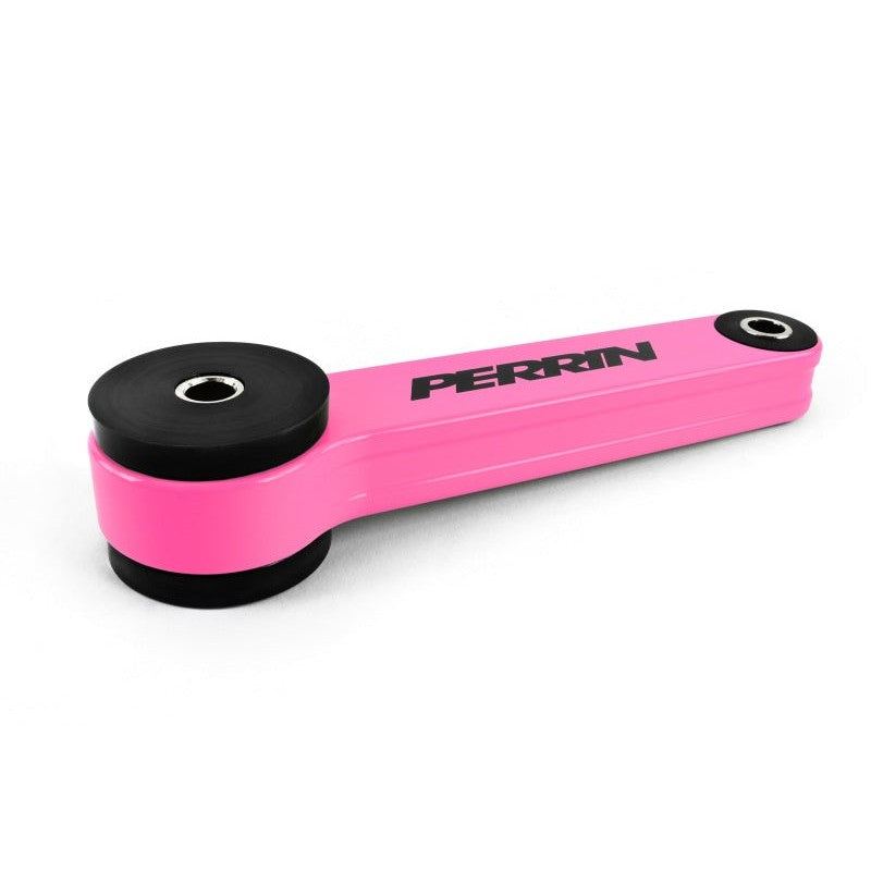 Pink anodized PERRIN pitch stop mount for Subaru engine stabilization.