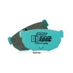 Project Mu D1 SPEC rear brake pads for 2003-2008 Nissan 350Z featuring high-friction compound and blue backing plates.