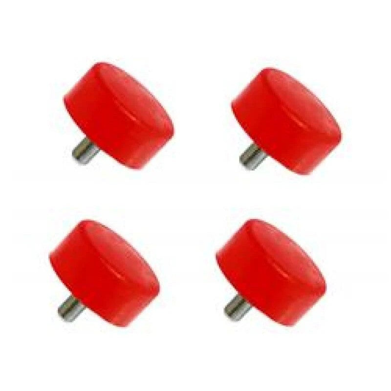 A pair of red Prothane polyurethane front bump stops for 1996-2002 Toyota 4Runner and Tacoma.