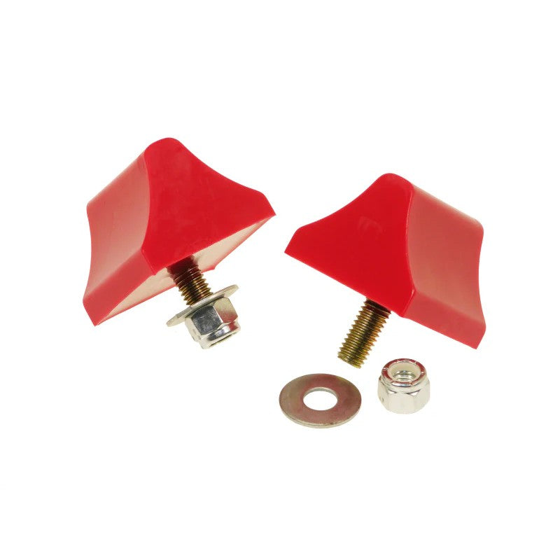 Red polyurethane wedge-shaped universal bump stop from Prothane, 1-3/8 x 2 x 2-1/4 inches
