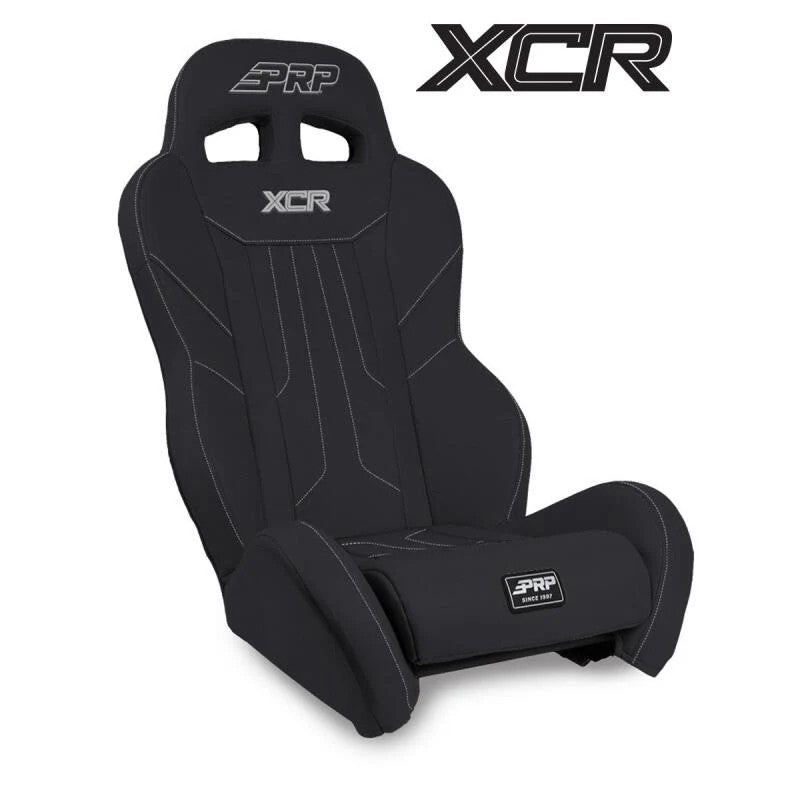 Black PRP XCR suspension seat for Polaris RZR featuring low side bolsters and dual harness slots.