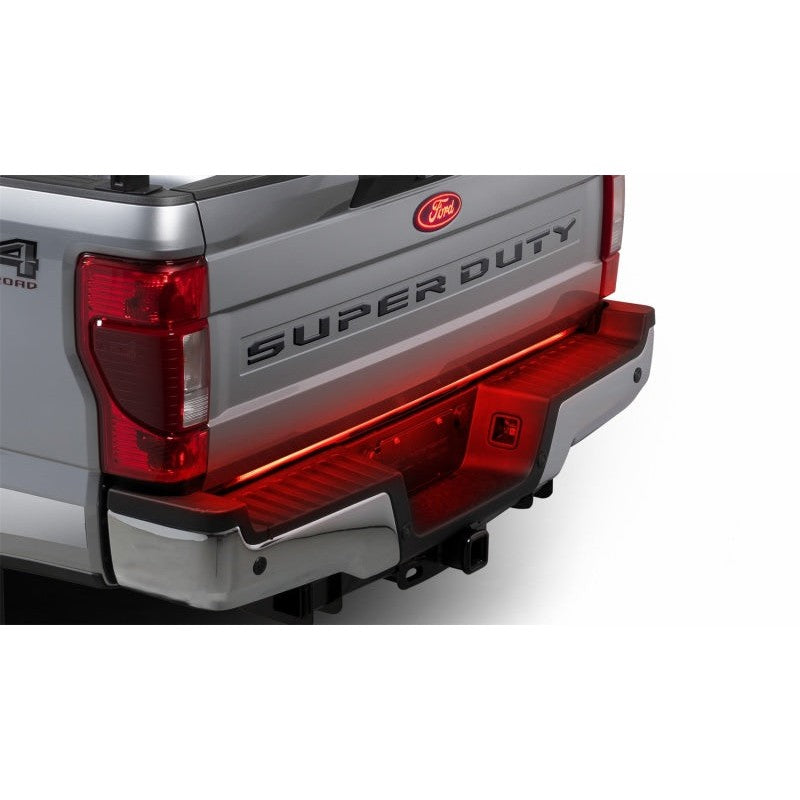 Putco 60-inch Red Blade LED tailgate light bar with vehicle-specific direct-fit wiring harness for GM trucks.
