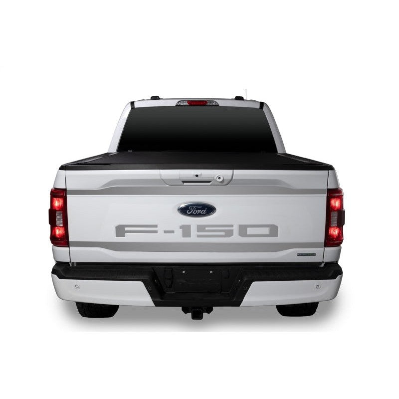 Polished 304 stainless steel Putco tailgate lettering kit installed on a 2021-2025 Ford F-150.