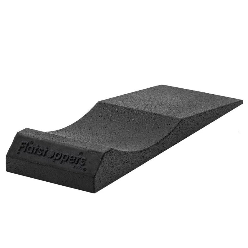 Four black Race Ramps FlatStoppers 10-inch wide tire storage ramps with a curved design to prevent flat spots.