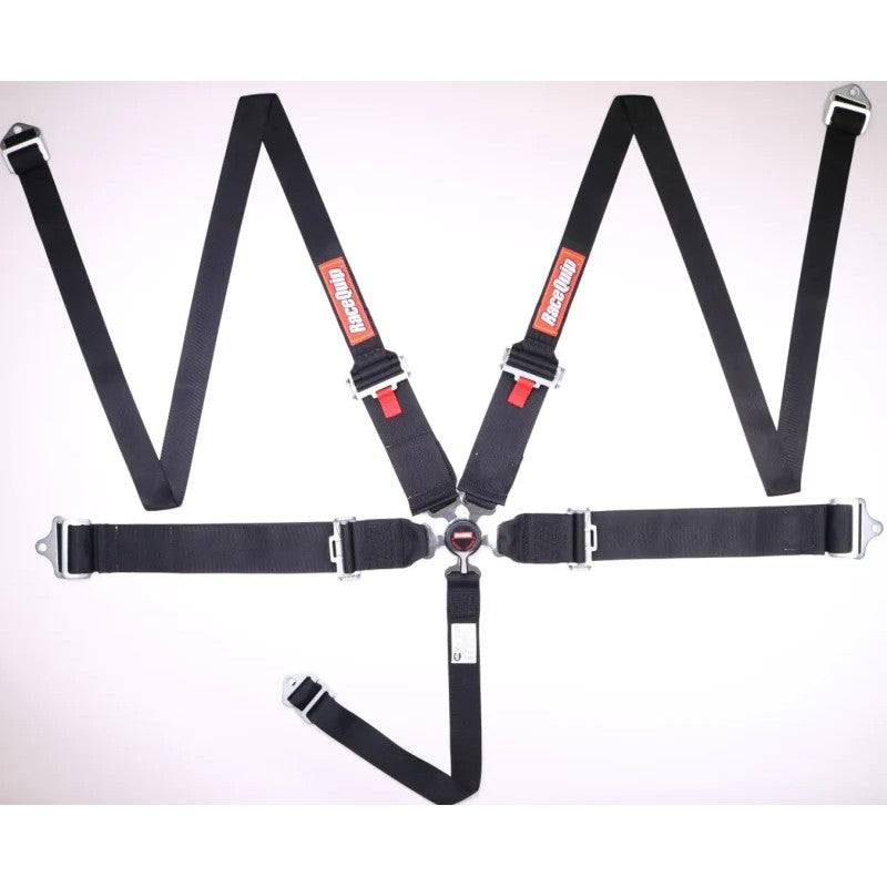 Black RaceQuip 5-point racing harness with camlock buckle, pull-down lap adjustment, and HNR shoulder straps.