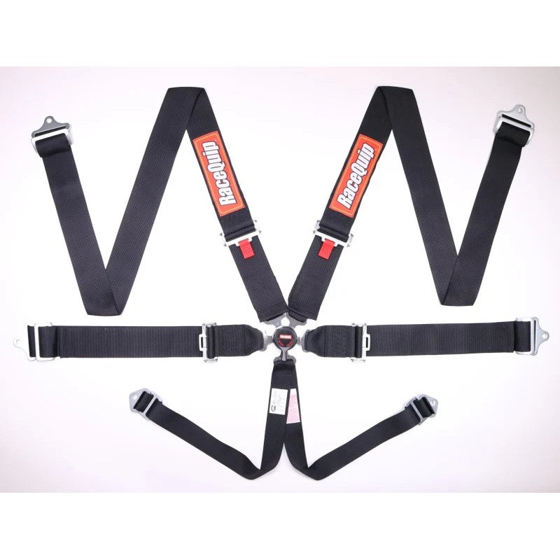 RaceQuip black 6-point racing harness with magnesium alloy camlock buckle and pull-down lap belt adjustment.