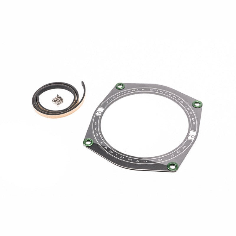 Transparent Radium Engineering fuel pump access cover for 2008-2014 Subaru with laser-etched logos.