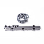 Black anodized Radium Engineering fuel rail for 2000-2005 Honda S2000 featuring 8AN ORB ports and CNC construction.