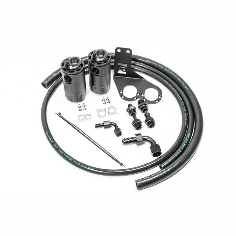 Dual black anodized aluminum Radium Engineering catch cans with Fluid Lock technology and brackets for Lotus Evora