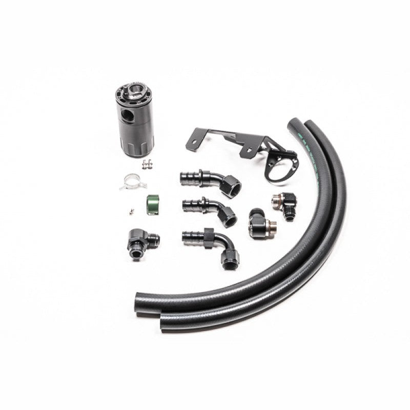 Radium Engineering CCV catch can kit with black anodized Fluid Lock canister for the B58 Toyota GR Supra.