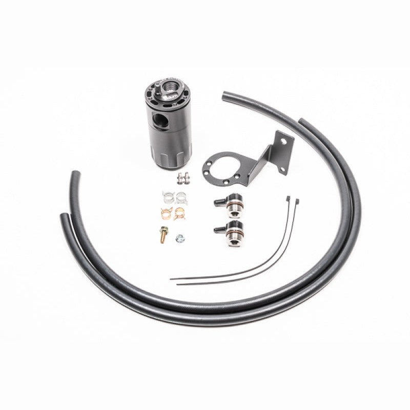 Radium Engineering black anodized PCV catch can with Fluid Lock mechanism, mounting bracket, and hoses for MK5 Supra.