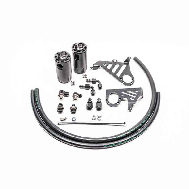 Dual black anodized Radium Engineering Fluid Lock catch cans with mounting brackets and hoses for Ford Focus ST.