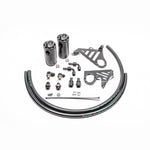 Dual black anodized Radium Engineering Fluid Lock catch cans with mounting brackets and hoses for Ford Focus ST.