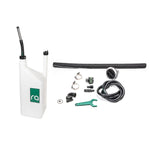 Radium Engineering FCST-X remote refueling kit featuring 1.5 inch hose, 8AN vent line, dump can, and screw-off filler cap.
