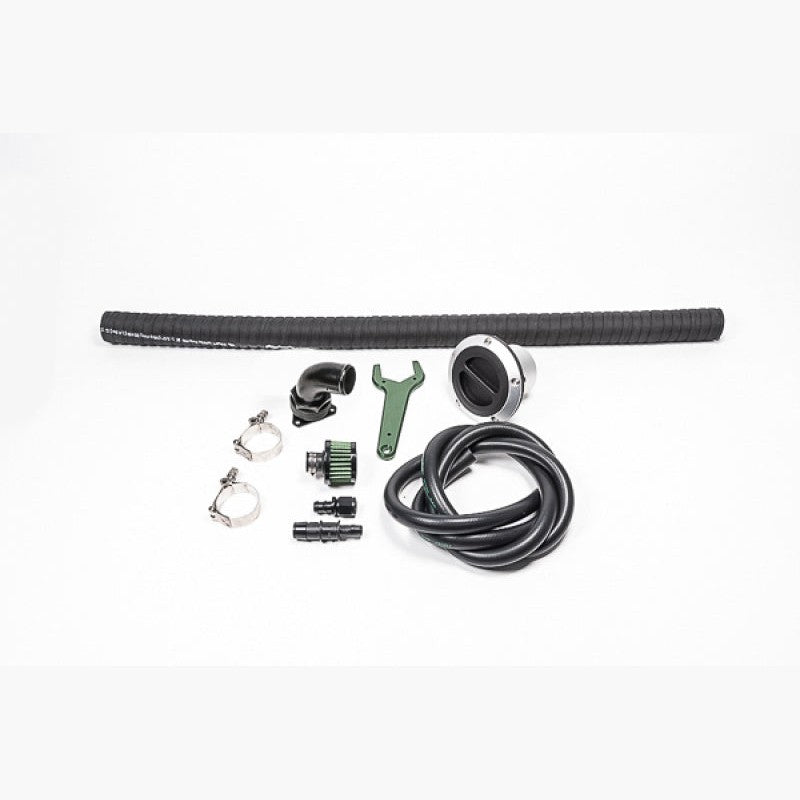 Radium Engineering FCST-X remote refueling kit featuring 1.5-inch fill hose, screw-off cap, and 8AN vent line.