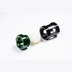 Radium Engineering anodized aluminum fuel collection valve assembly and check valve bushing.
