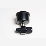 Radium Engineering mechanical fuel pressure gauge attached to a black anodized -6AN inline adapter fitting.