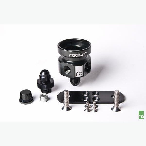 Black anodized Radium Engineering fuel pressure regulator body 20-0014 showing mounting points and top vacuum port.