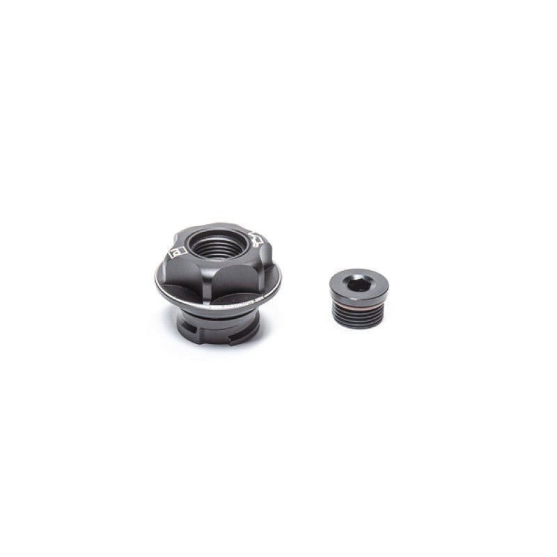 Radium Engineering GM LS engine oil fill cap with a removable center plug for breather port conversion.