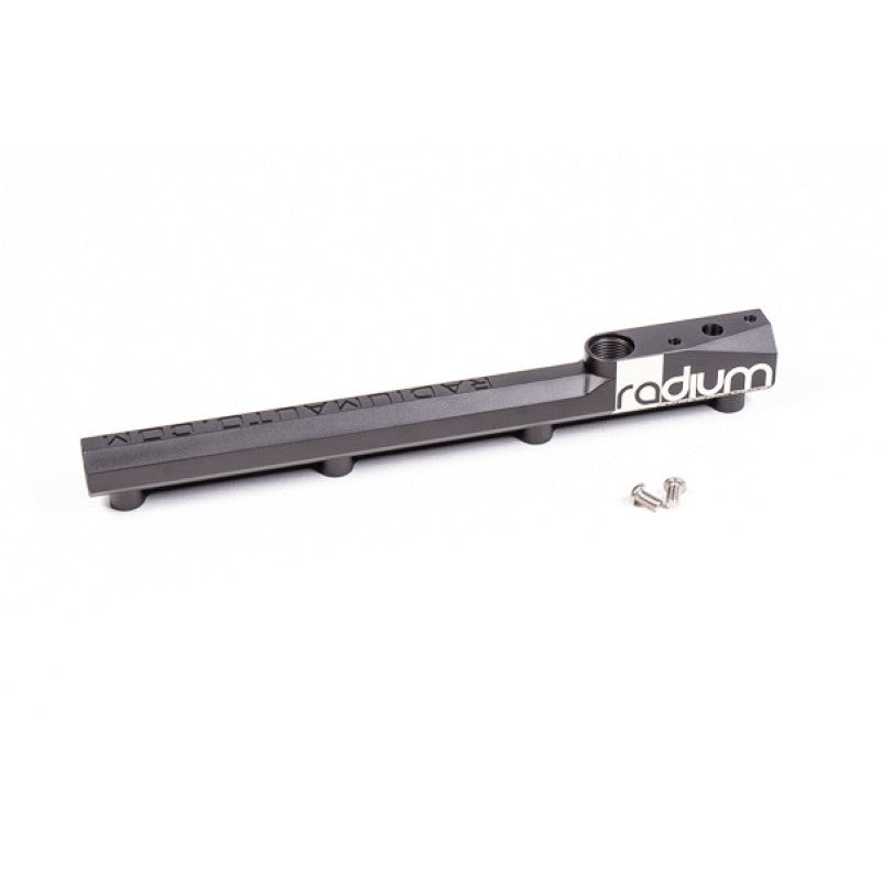 Anodized black CNC aluminum fuel rail for Honda B-Series engines featuring 8AN ORB ports.