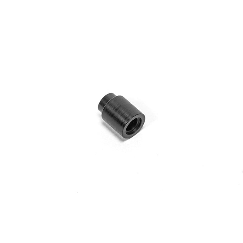 Radium Engineering 20mm thick black nylon insulating spacer for fuel rail installation.