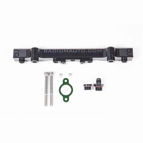 Radium Engineering black anodized high-flow fuel rail for 2005-2011 Lotus 2ZZ-GE engines.