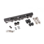 Black anodized Radium Engineering secondary top feed conversion fuel rail for Mazda 13B-REW rotary engines.