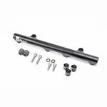 Black anodized Radium Engineering secondary fuel rail for Mazda 20B-REW 3-rotor engines.