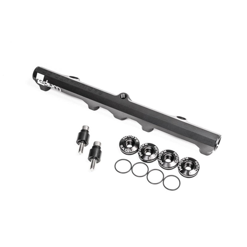 Anodized CNC machined Radium Engineering fuel rail for Nissan KA24DE top feed injector conversion.