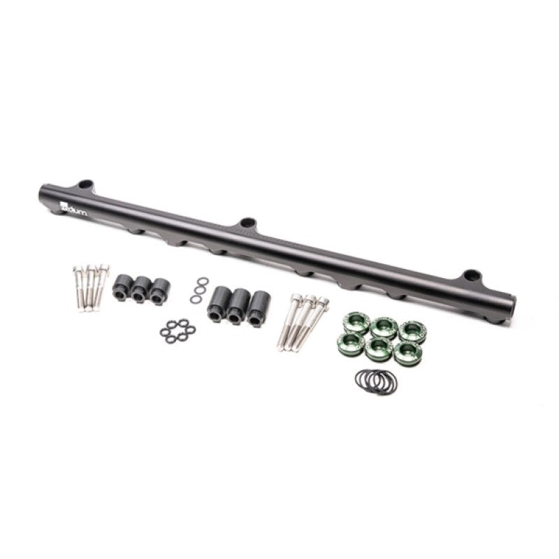 Radium Engineering black anodized aluminum top feed fuel rail for Nissan RB25DET engines