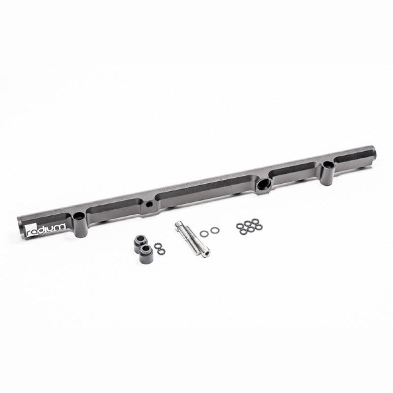 Black anodized Radium Engineering high-flow fuel rail for Nissan RB26DETT engines