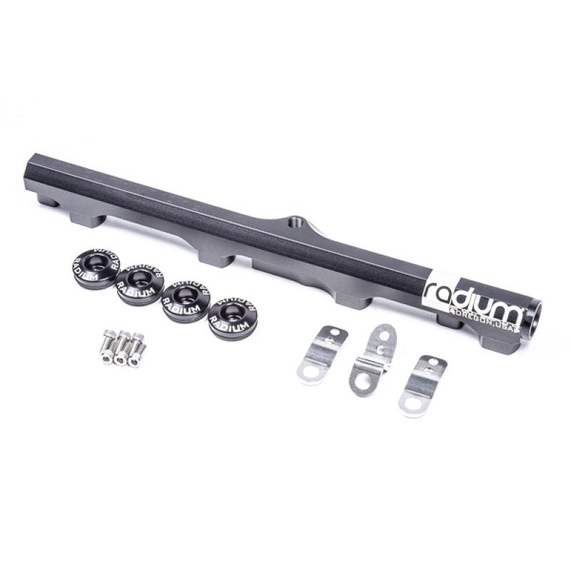 Anodized Radium Engineering top feed fuel rail for Nissan Silvia S13 SR20DET with 8AN ports and mounting hardware.