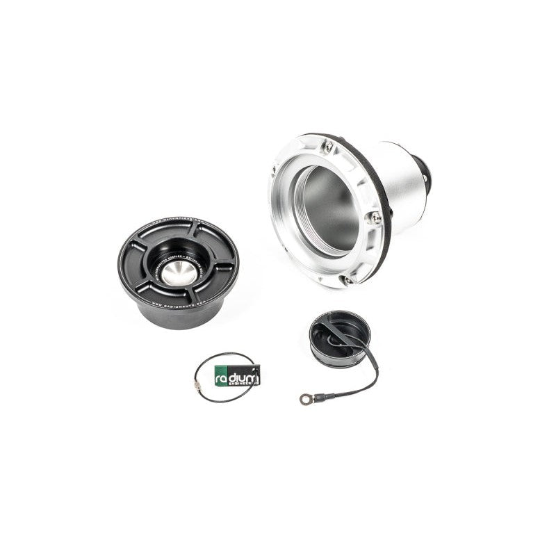 Radium Engineering remote mount SVF swing valve fuel filler showing 1.5 inch hose barb and black tethered dust cap.
