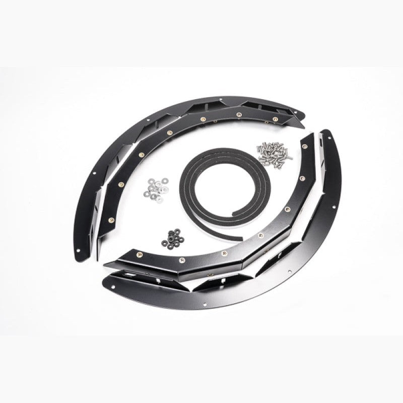 Precision Radium Engineering mounting brackets and hardware for circular spare tire well fuel cell installation.