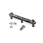 Black anodized Radium Engineering billet aluminum fuel rail for the Toyota G16E-GTS engine