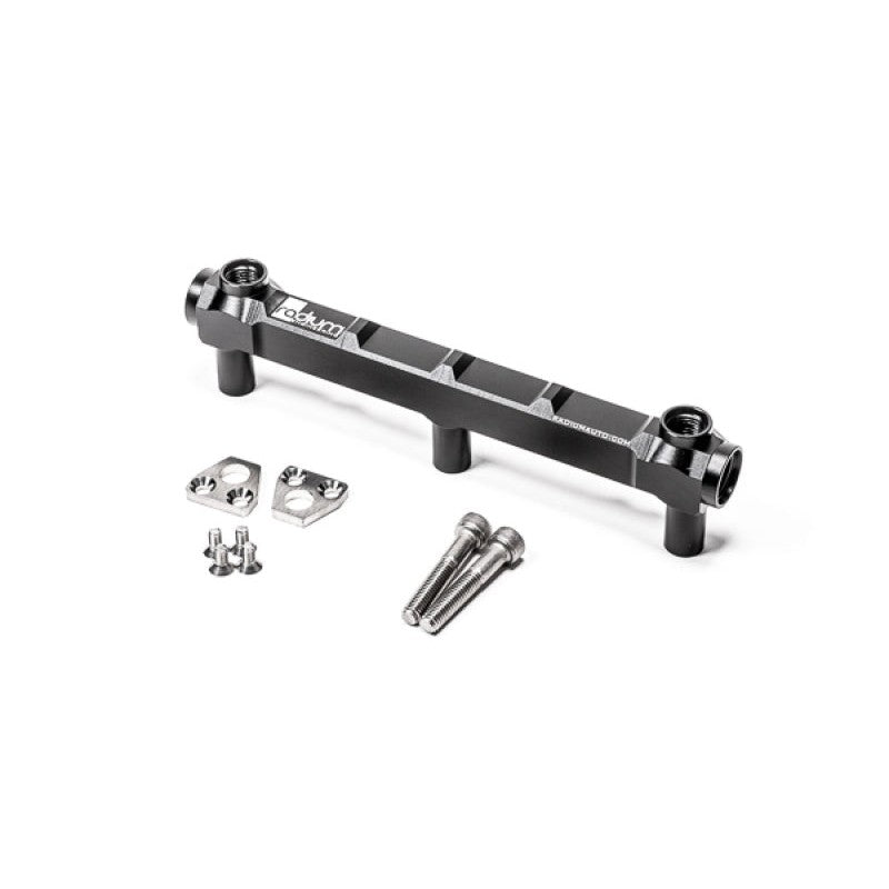 Black anodized Radium Engineering billet aluminum fuel rail for the Toyota G16E-GTS engine