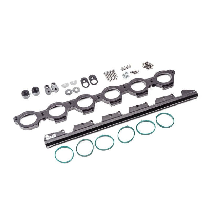 Radium Engineering aluminum port injection adapter plate and fuel rail for 2020-2022 Toyota Supra and BMW Z4 B58 engines.