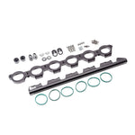 Radium Engineering aluminum port injection adapter plate and fuel rail for 2020-2022 Toyota Supra and BMW Z4 B58 engines.