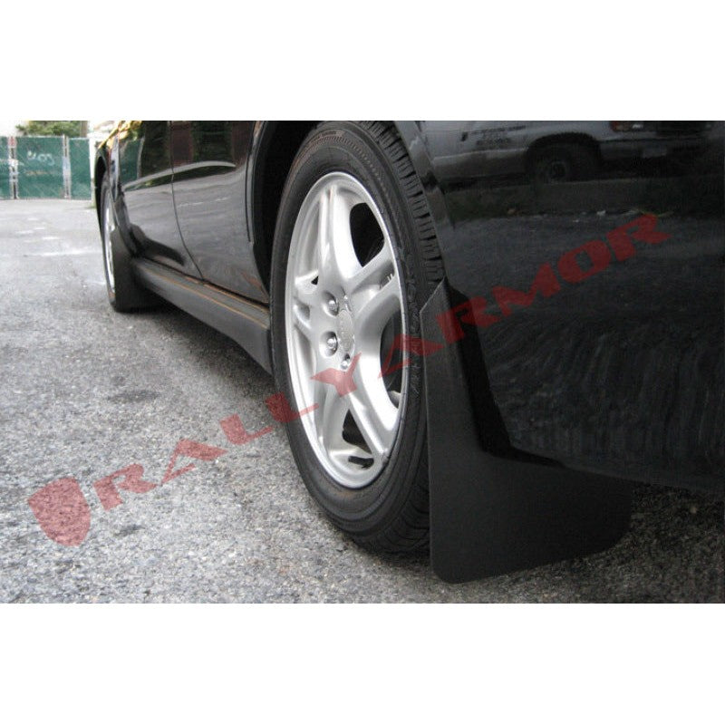 Set of four Rally Armor Basic black mud flaps with black logos, stainless steel brackets, and mounting hardware.