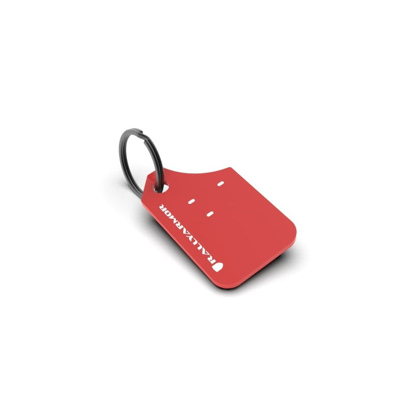Red flexible urethane Rally Armor Mini UR mud flap keychain with white logo and silver split ring.
