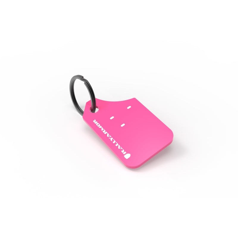 Pink Rally Armor keychain featuring a white logo and a silver metal split ring.