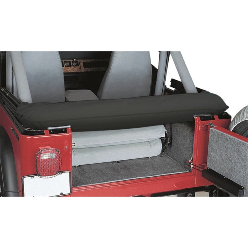 Rampage Black Denim soft top storage boot installed on a 1997-2006 Jeep Wrangler securing the folded canvas and framework.