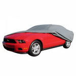 Grey Rampage 4-layer Easyfit car cover featuring a diamond bond pattern and side grommets for secure tie-downs.